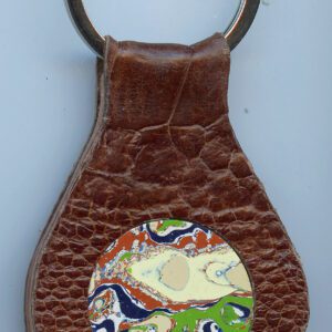 Leather keychain with colorful circular design.