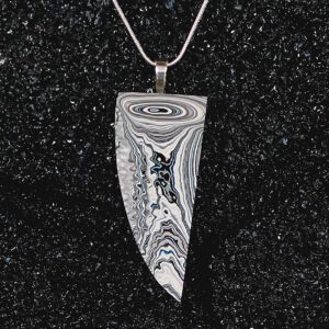 Triangular black and white swirled pendant necklace