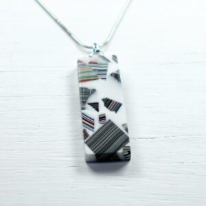 Multicolored geometric pendant on silver chain