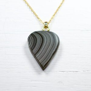 Gray teardrop layered pendant on gold chain