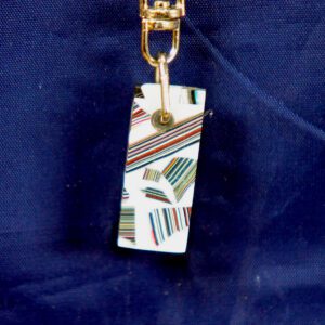 Striped rectangular pendant with gold clasp