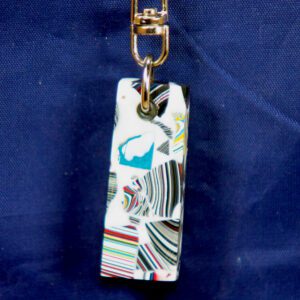 Multicolored striped resin keychain with gold clasp