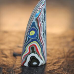 Finished Piece of Fordite - 41.51mm x 14.35mm x 8.8mm     (F-042)